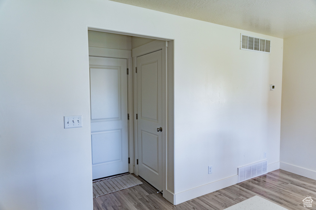 Interior space with light wood-type flooring