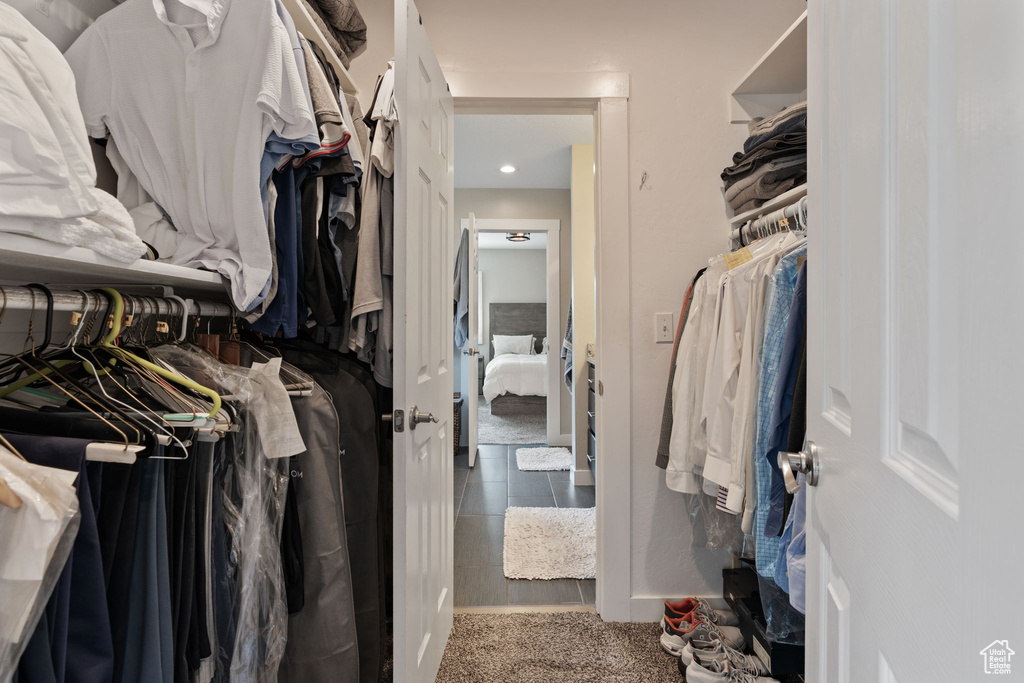 Spacious closet with tile flooring