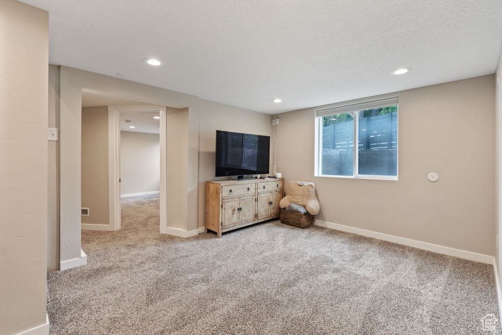 Interior space featuring a textured ceiling