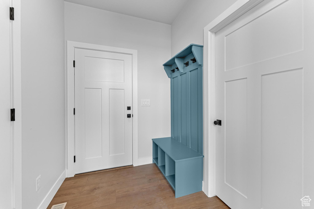 Mudroom featuring light hardwood / wood-style floors