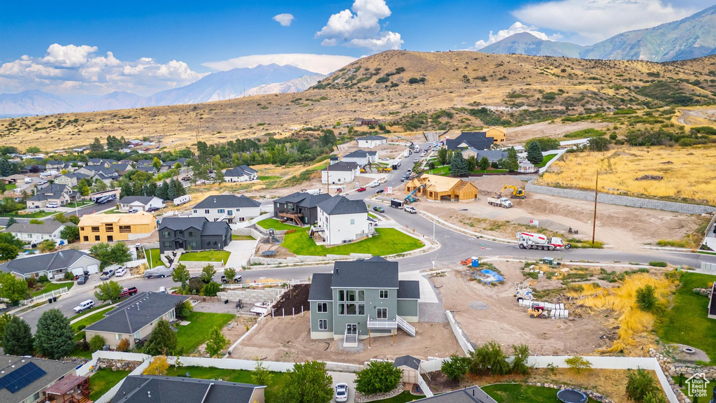 Birds eye view of property featuring a mountain view