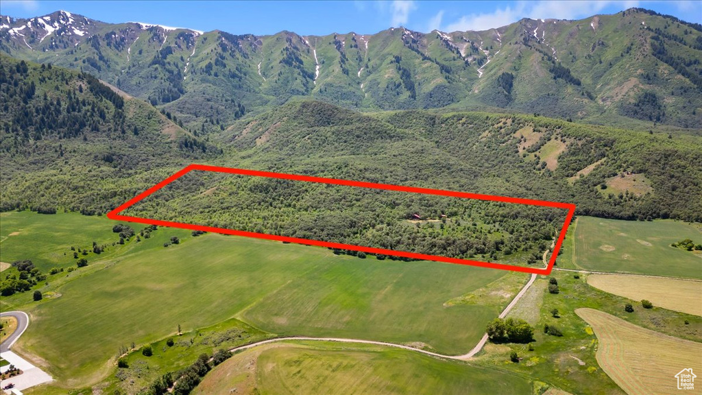 Aerial view with a mountain view and a rural view