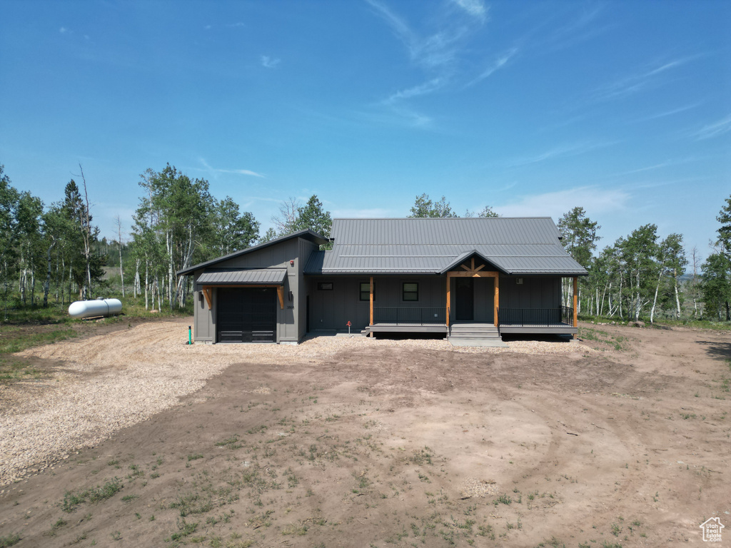 View of front of property with a garage