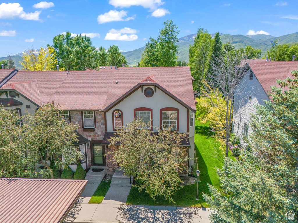 View of front of house with a mountain view