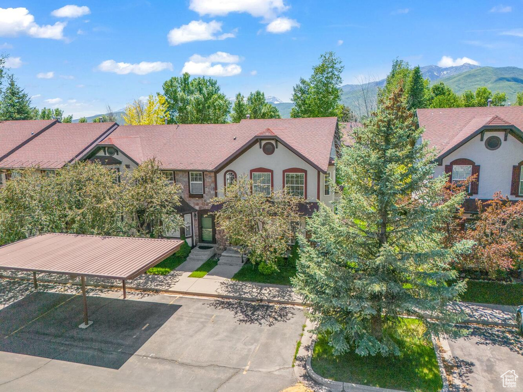 View of front of house with a mountain view