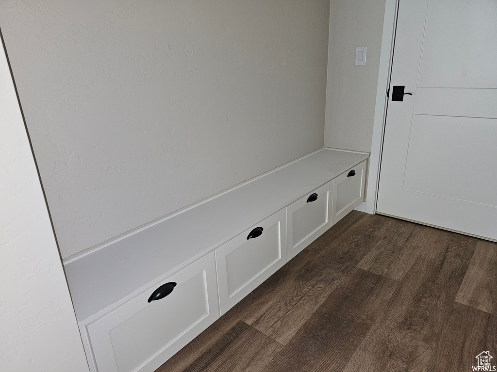 Mudroom with dark hardwood / wood-style floors