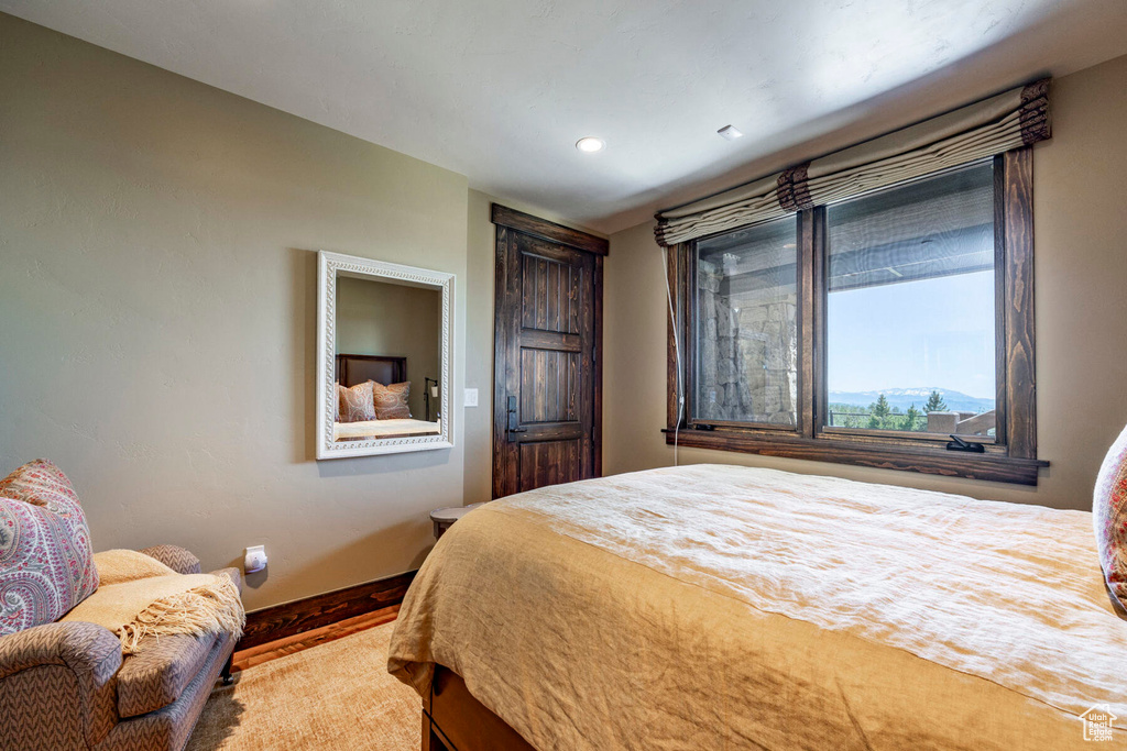 Bedroom featuring baseboards and recessed lighting