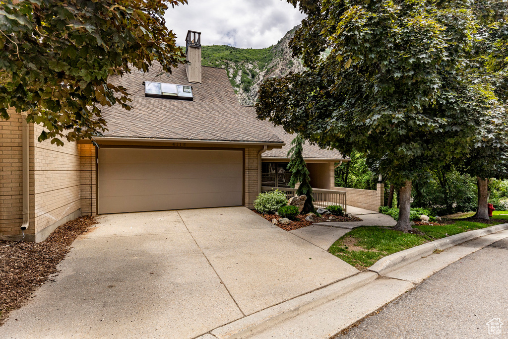 View of front of property with a garage