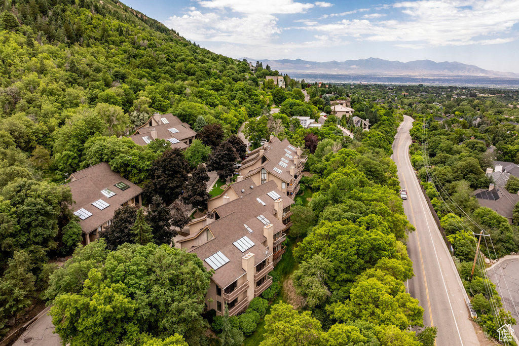 Birds eye view of property with a mountain view