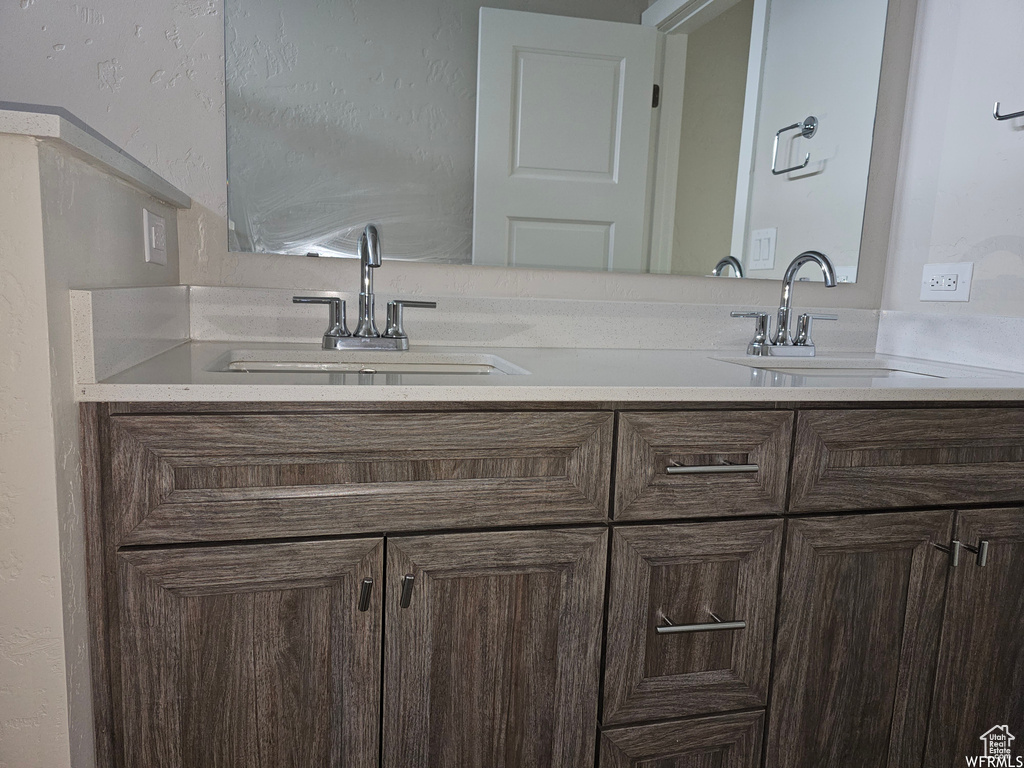 Bathroom featuring dual vanity