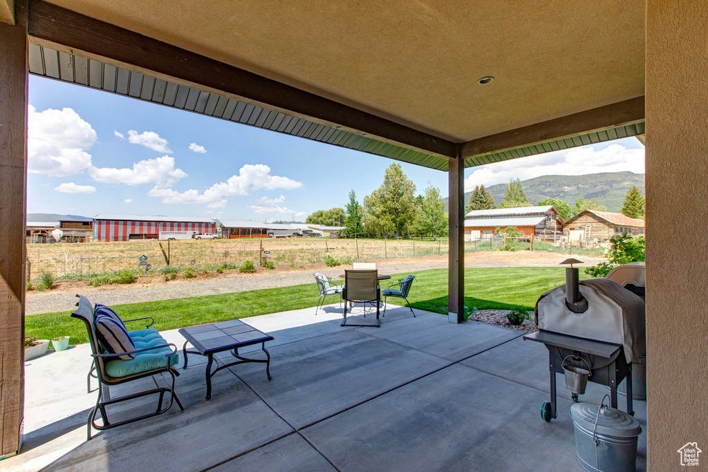 View of terrace featuring area for grilling