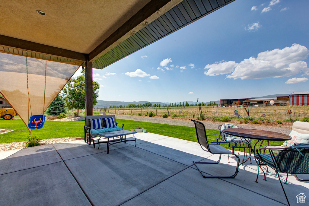 View of terrace featuring a rural view