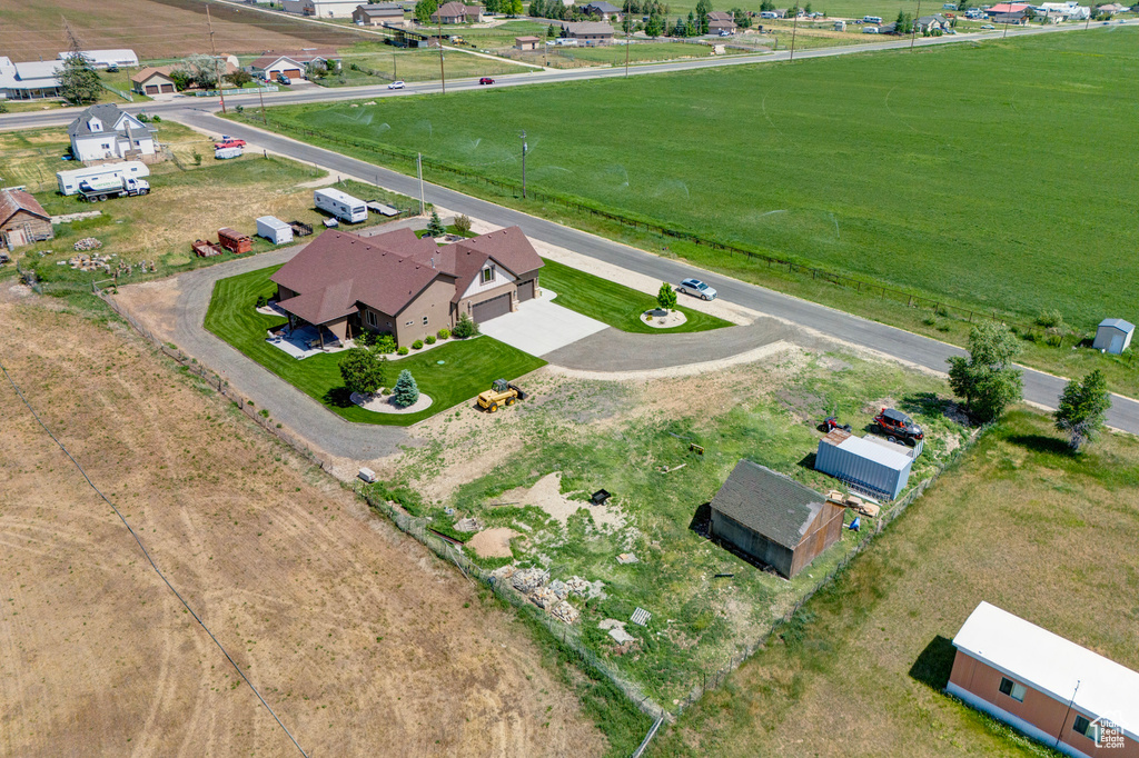 Birds eye view of property featuring a rural view