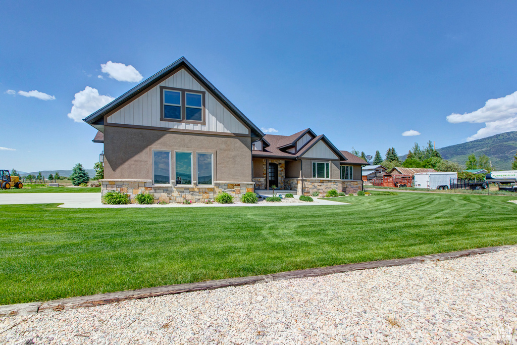 View of front of home with a front lawn