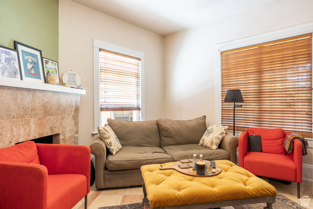 Tiled living room featuring a fireplace