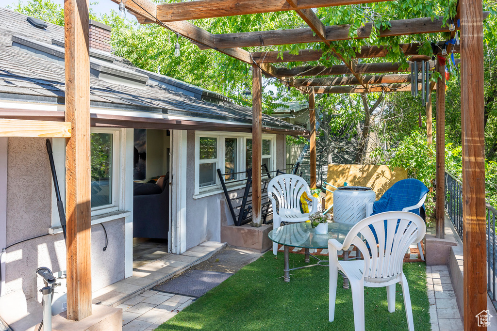 View of terrace with a pergola