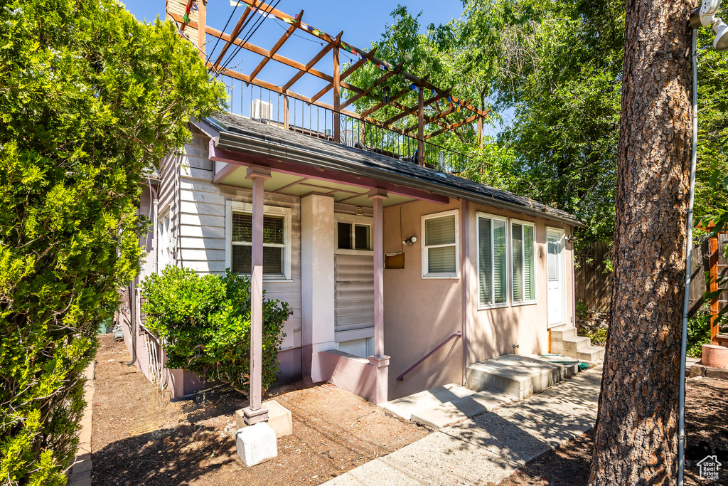 View of front of property featuring a pergola