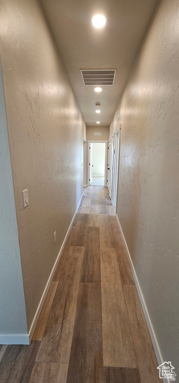 Hall featuring hardwood / wood-style flooring