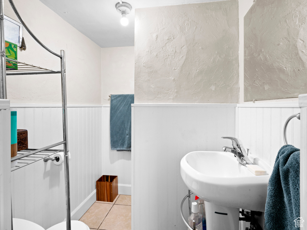 Bathroom featuring tile flooring