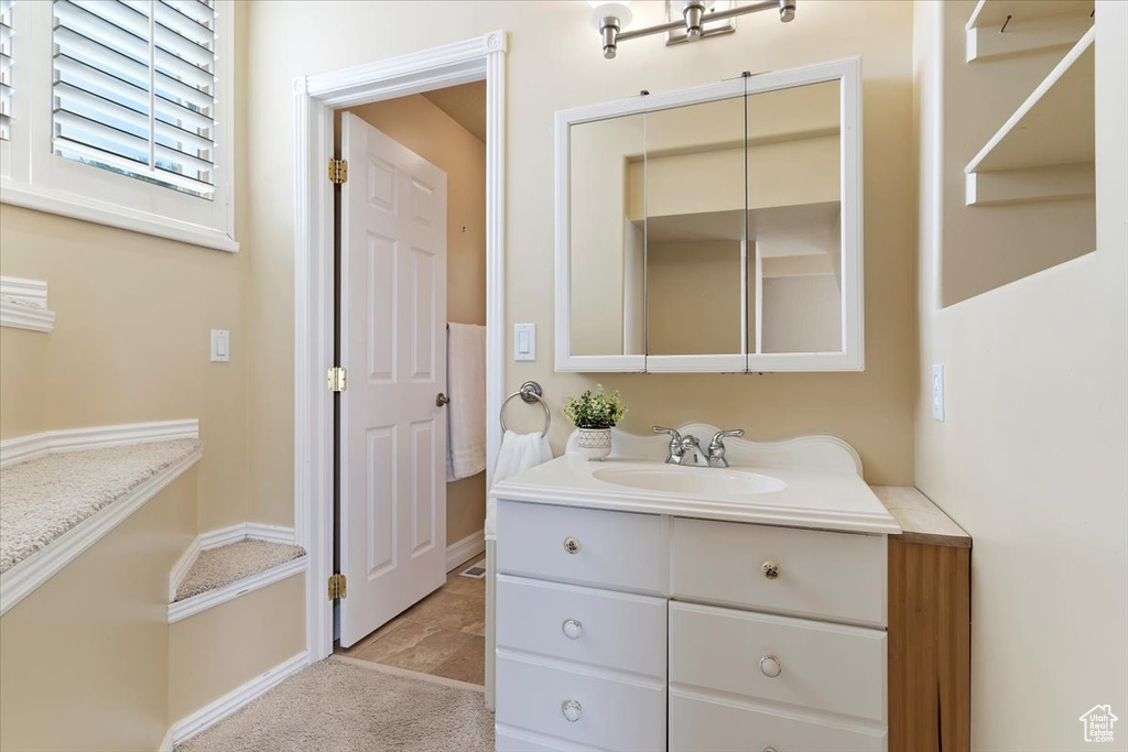 Bathroom with tile floors and oversized vanity