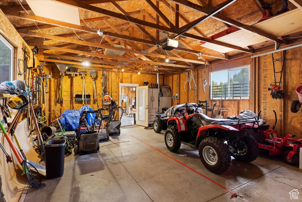 Garage featuring a garage door opener