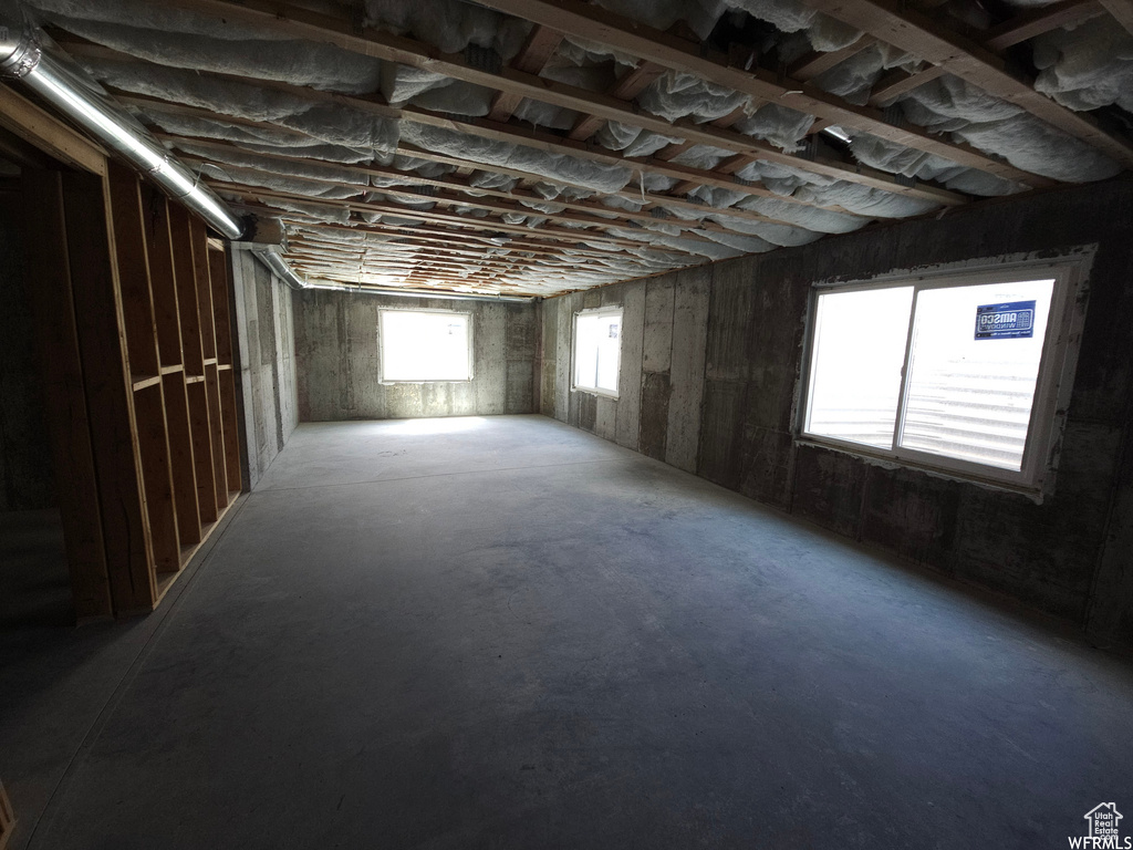 Interior space featuring concrete flooring