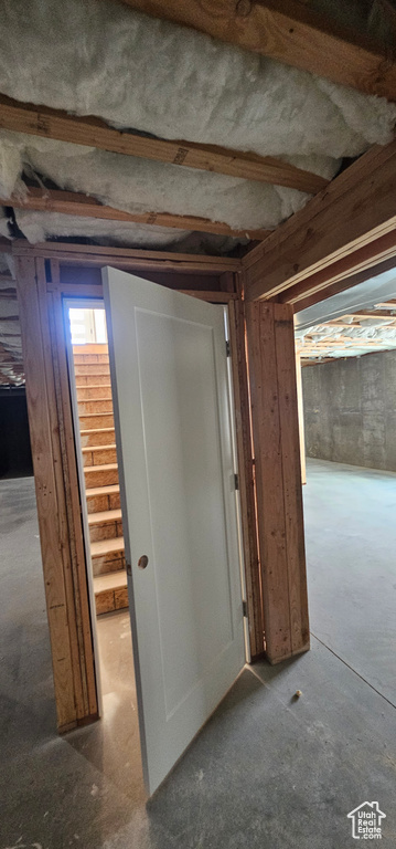 Hallway with concrete floors