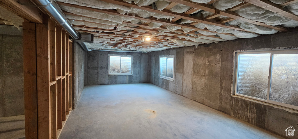 Basement featuring plenty of natural light