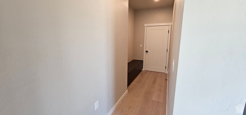 Hallway featuring light hardwood / wood-style floors