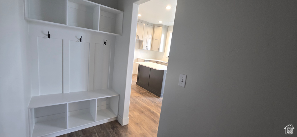 Mudroom with hardwood / wood-style floors