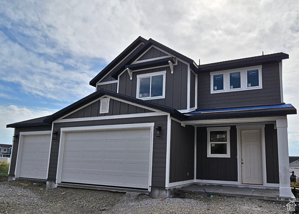 View of front of home with a garage