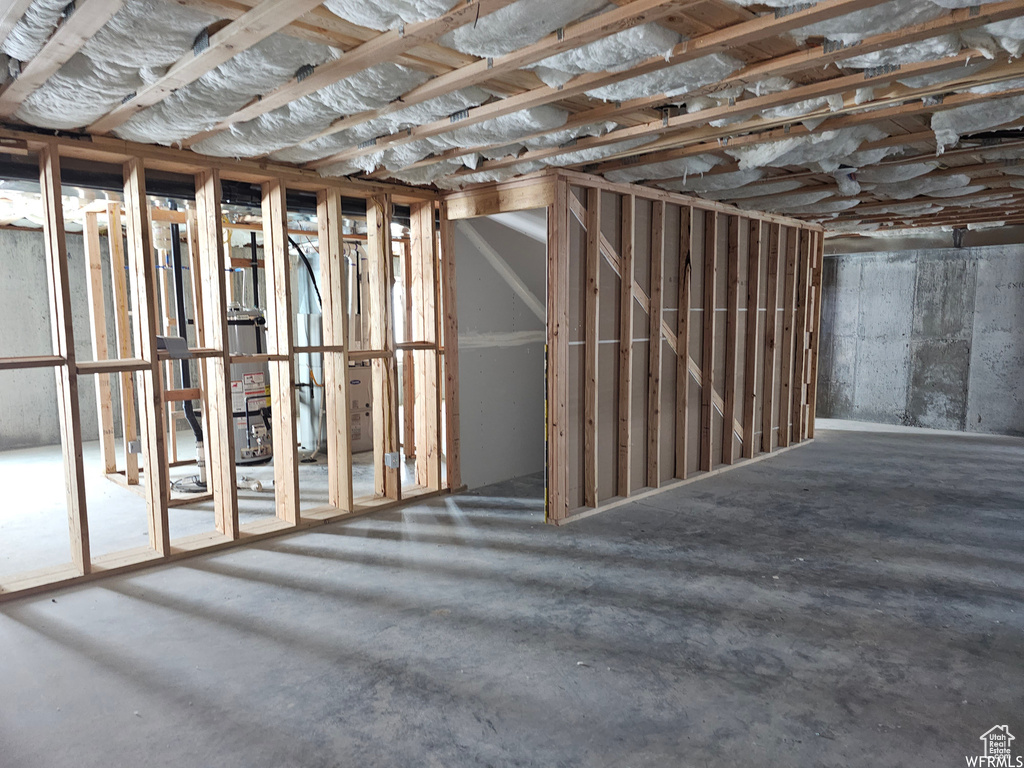 Basement featuring water heater