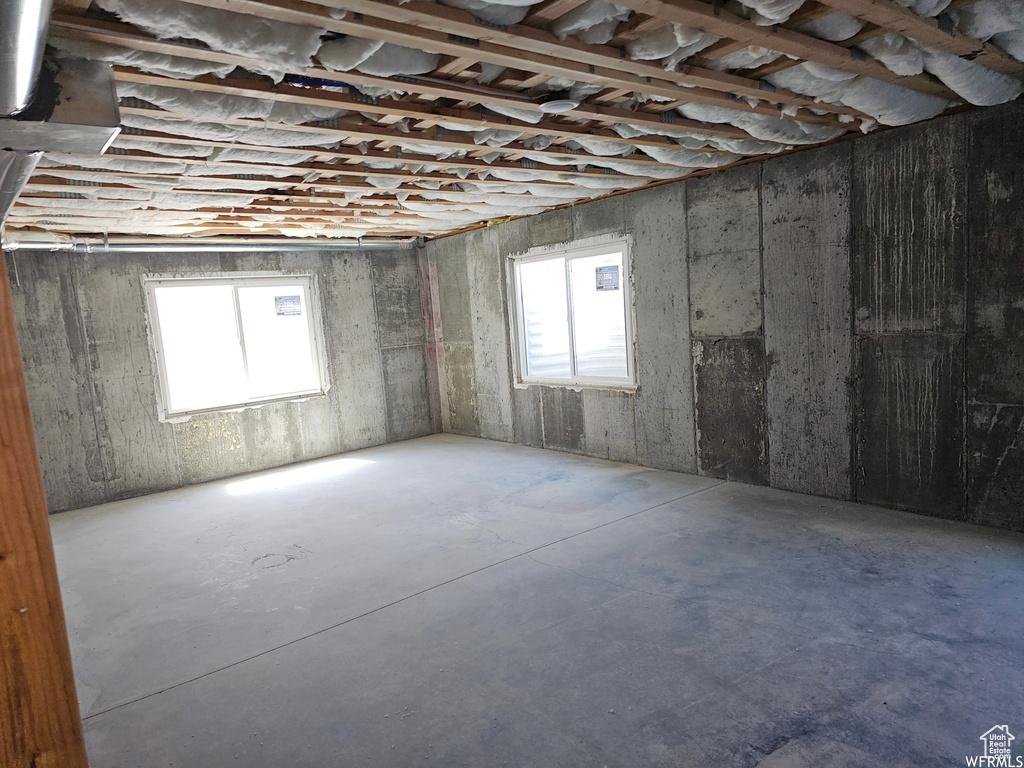 Basement featuring a wealth of natural light