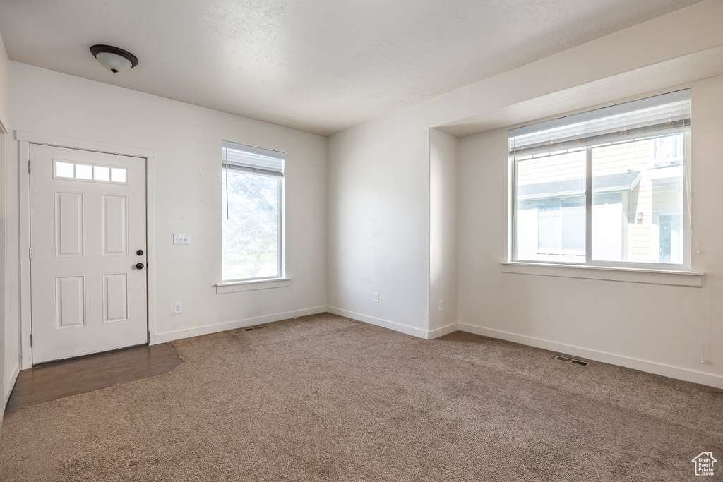 View of carpeted foyer entrance