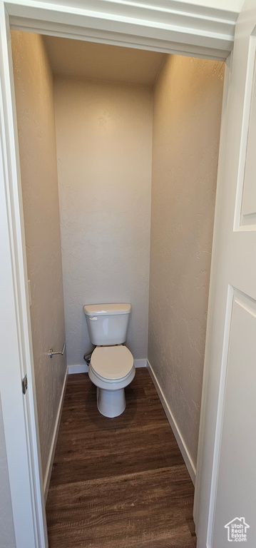 Bathroom featuring toilet and hardwood / wood-style floors