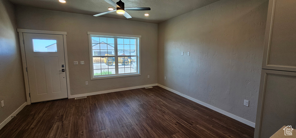 Entryway featuring dark hardwood / wood-style floors and ceiling fan