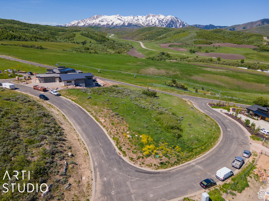 Drone / aerial view featuring a mountain view and a rural view