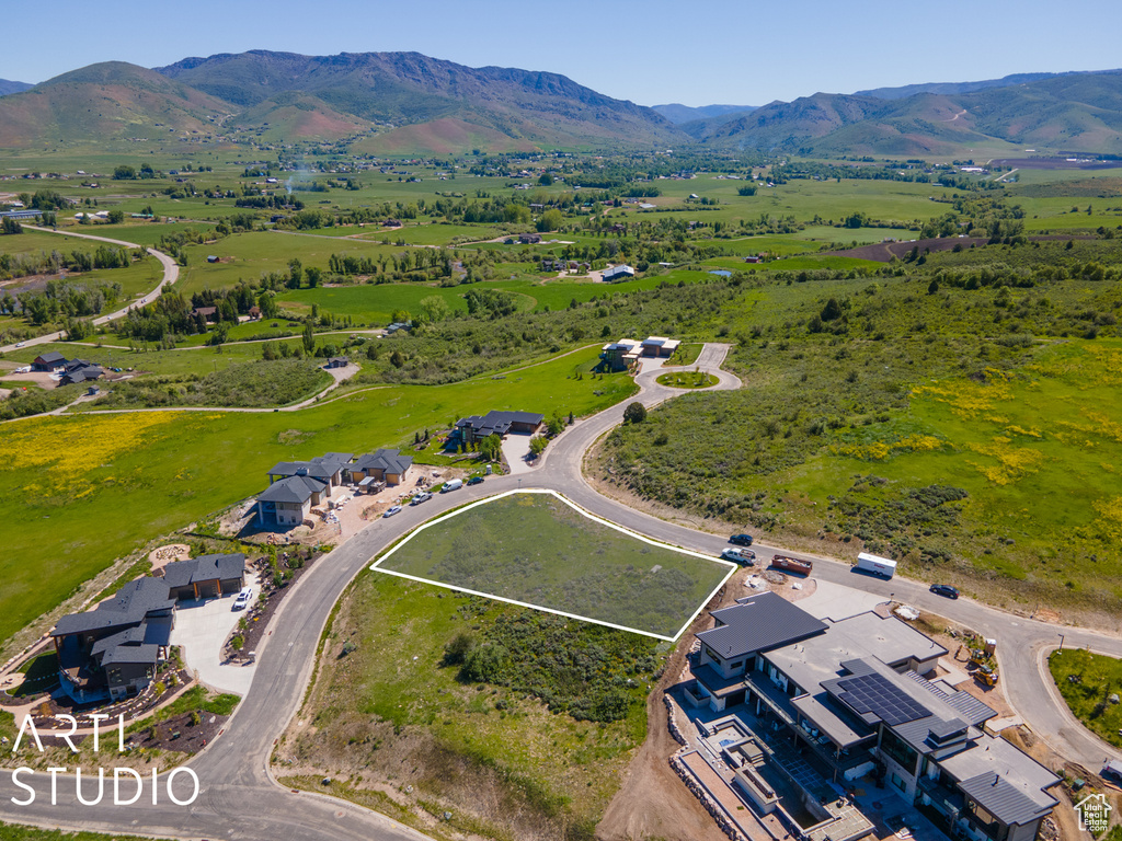 Drone / aerial view featuring a mountain view