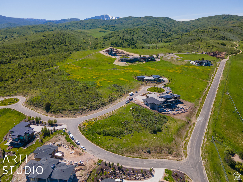 Birds eye view of property featuring a mountain view
