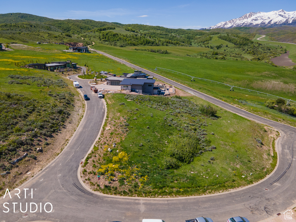 Drone / aerial view with a mountain view and a rural view