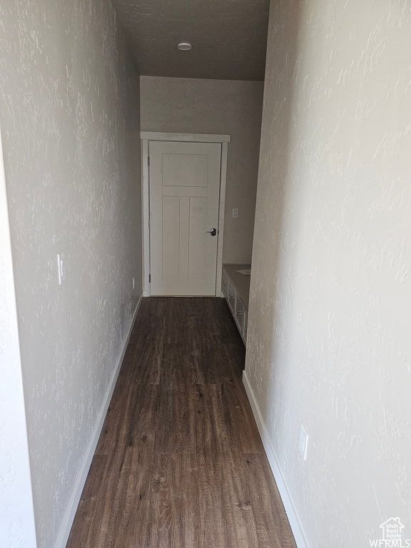 Corridor with wood-type flooring