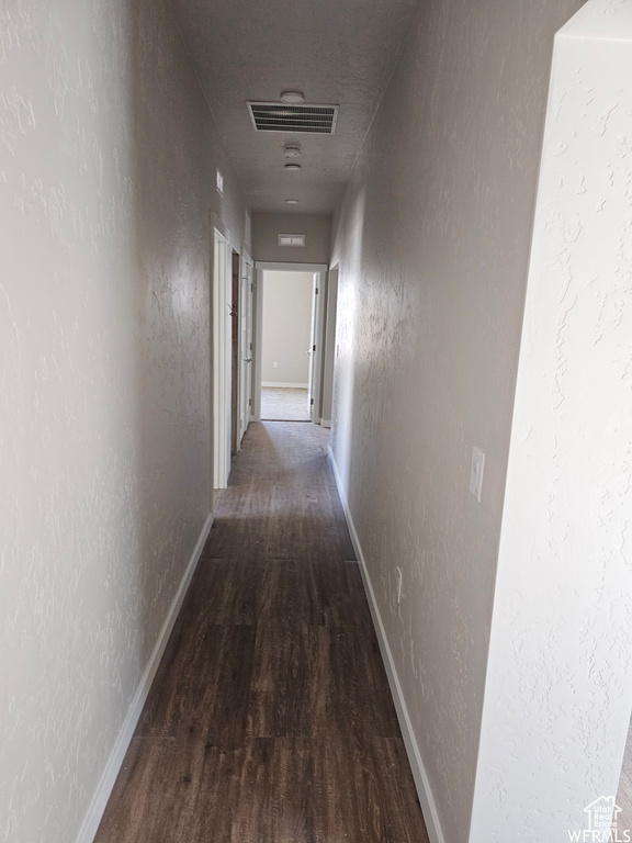 Hall with wood-type flooring