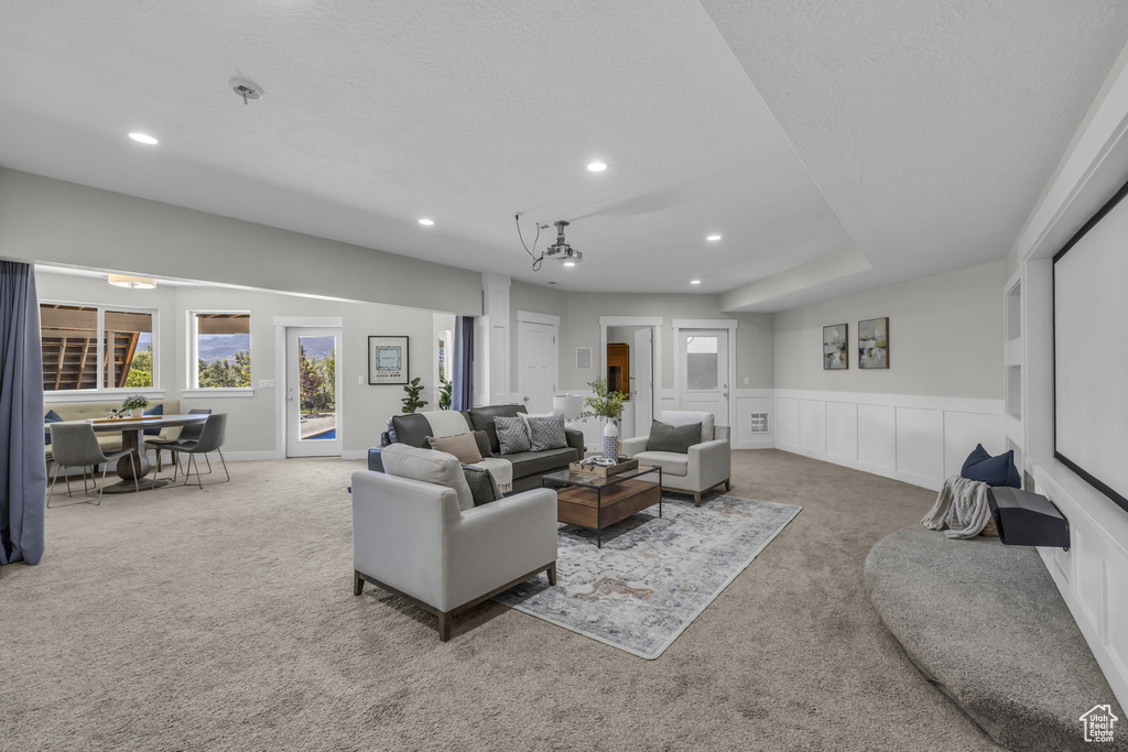 Living room featuring carpet floors