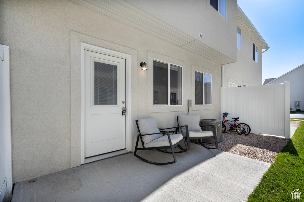 Exterior space featuring a patio and central AC unit