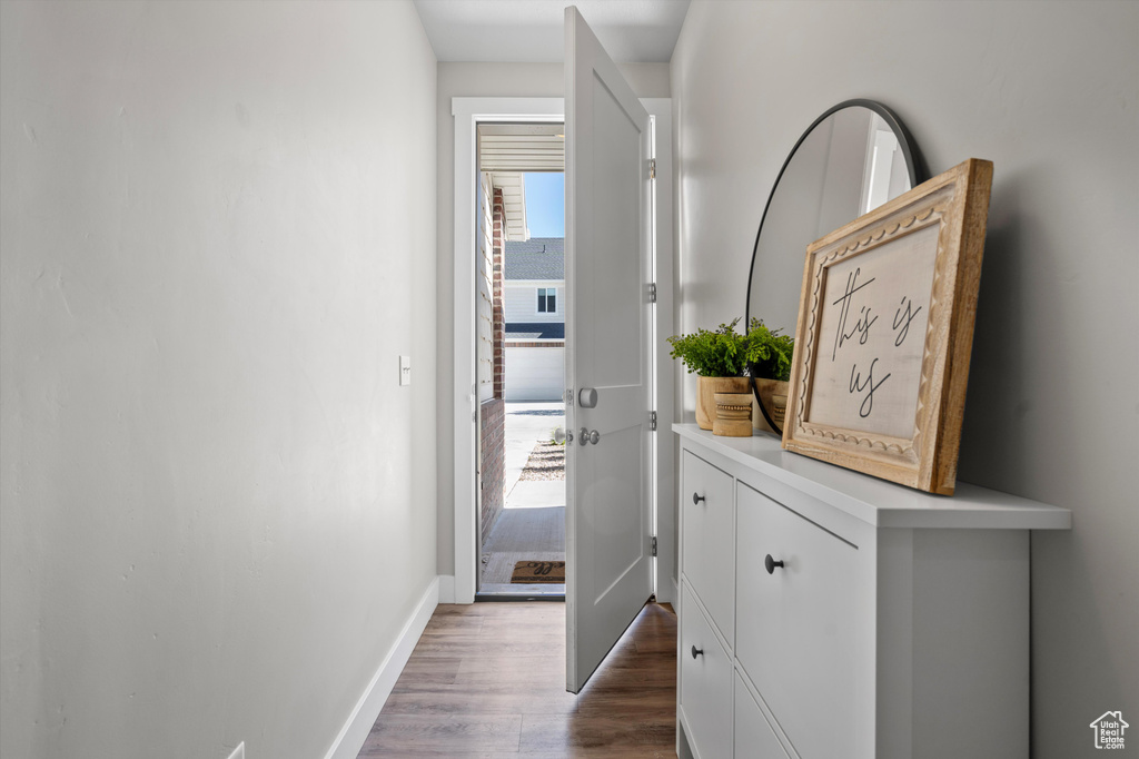 Hallway featuring hardwood / wood-style floors