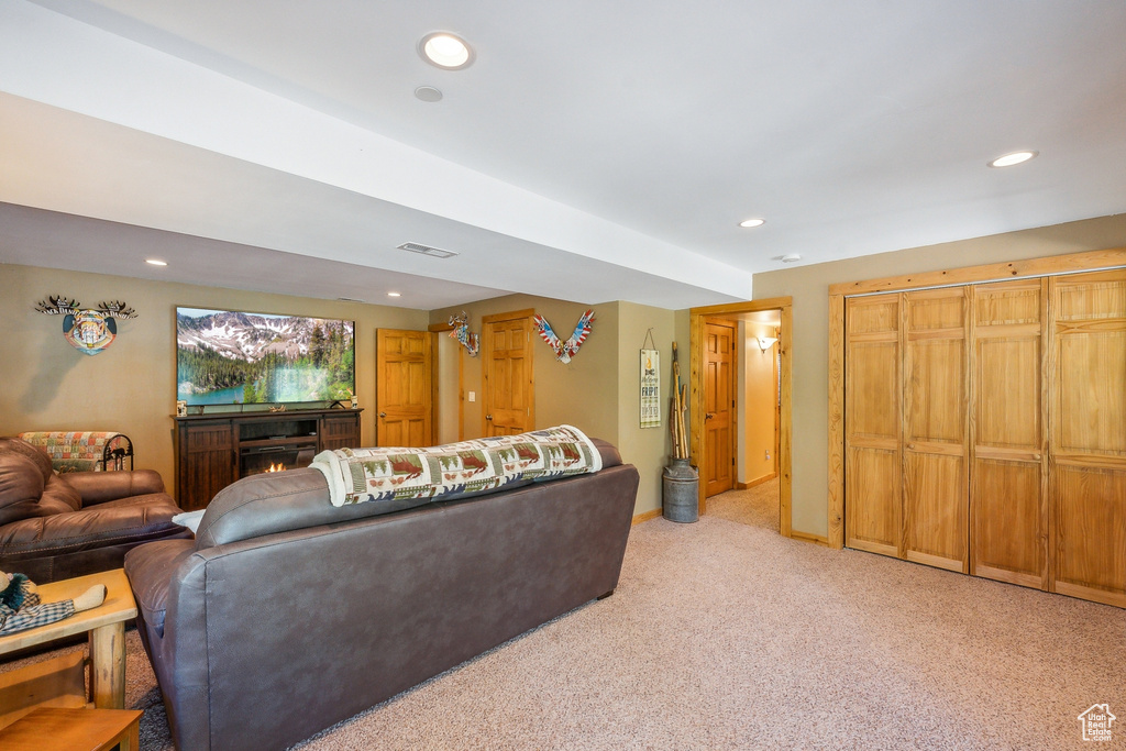 Living room with light carpet