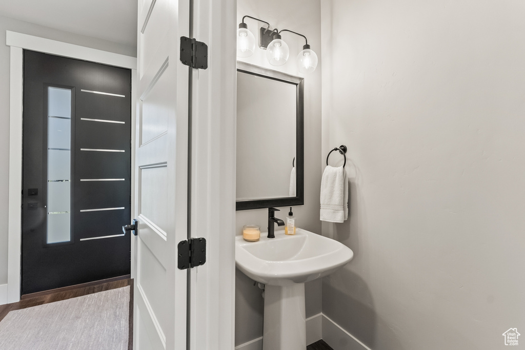 Bathroom featuring hardwood / wood-style floors