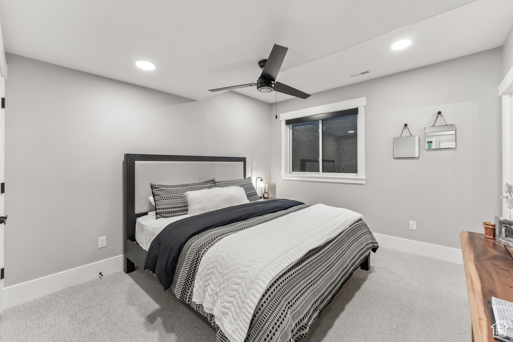 Bedroom with carpet and ceiling fan