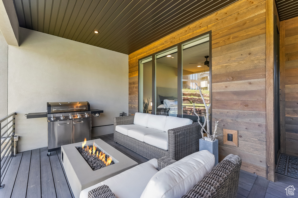 Exterior space with outdoor lounge area and grilling area