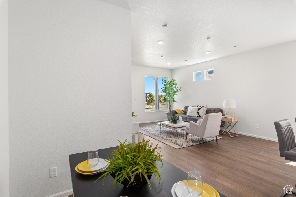 Living room with wood-type flooring